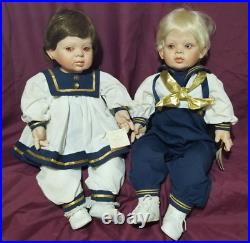 Set of FayZah Spanos porcelain Jacques and Jolie dolls
