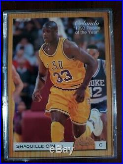 Shaquille o'neal rookie cards in wooden plaque. All cards are in mint condition